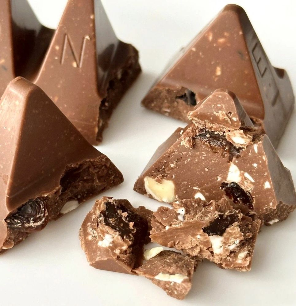 Toblerone шоколад молочный с изюмом и орехом 100 г 3 шт