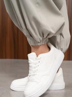 Брюки алладины женские на резинке с боковыми карманами