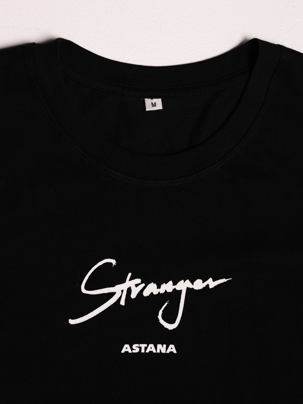T-shirt with "DQ 2024" print