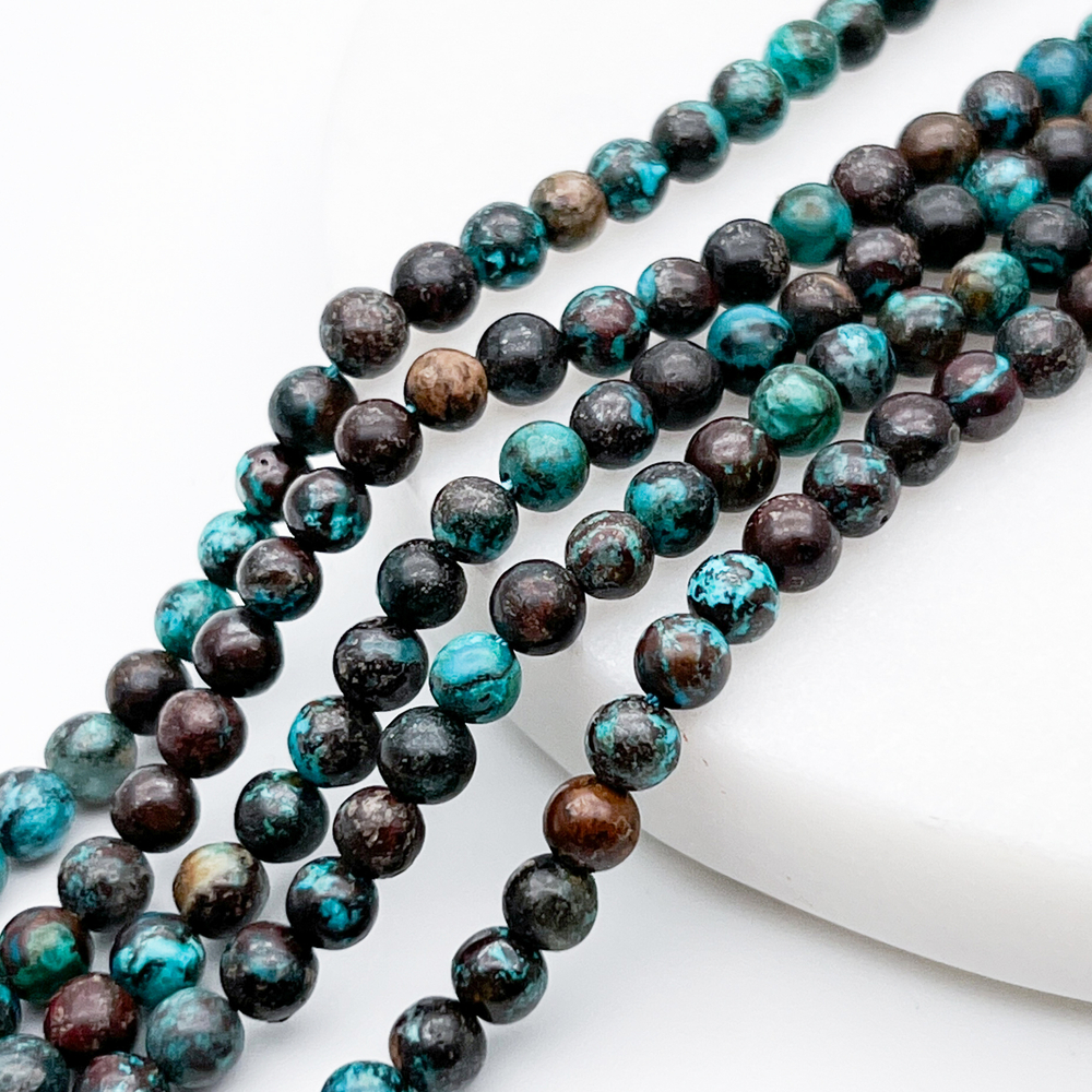 Хризоколла бусины (в породе), диаметр около 4,6-4,8 мм, цена за отрезок 19 см (1/2 нити)