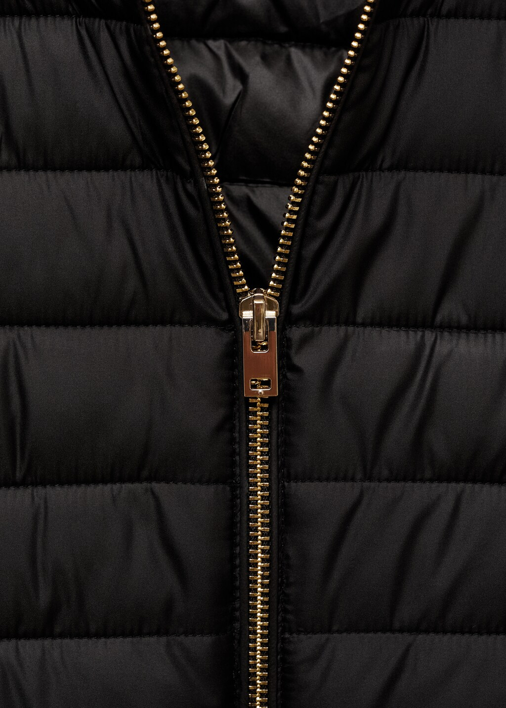 Стеганый жилет