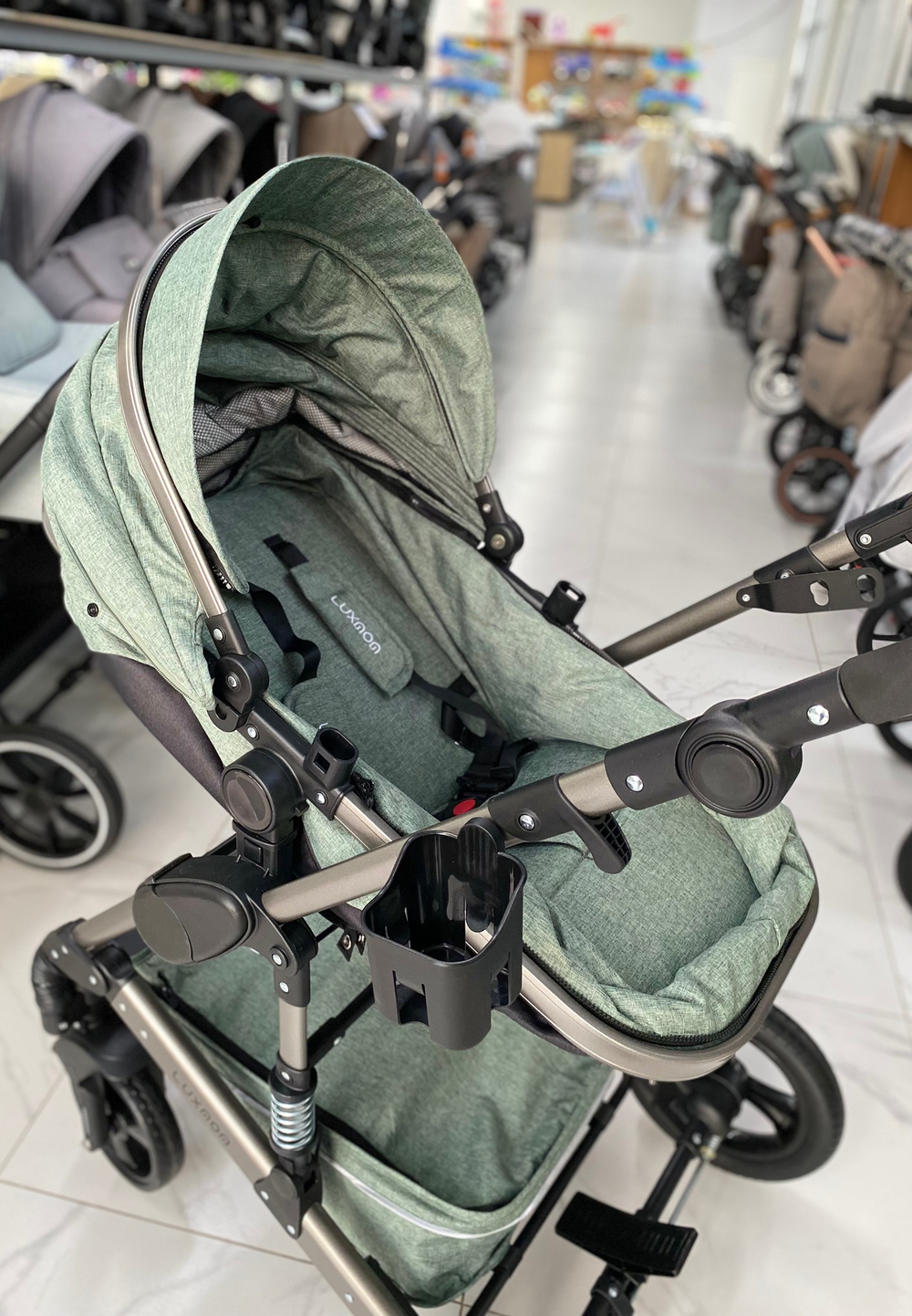 Детская коляска 3в1 LUXMOM 555 Зелёный текстиль