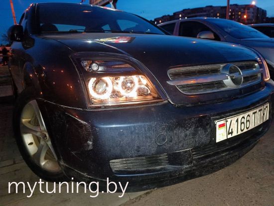 Передние фары Opel Vectra C angel eyes black