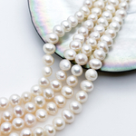 Жемчуг, размер около 6,5*5,5 мм, цена за 32-33 шт (1/2 нити)