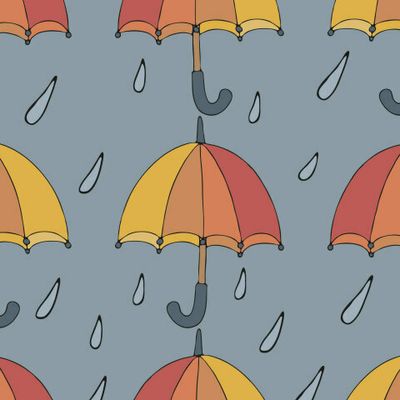 оранжевые зонтики на голубом фоне и капли дождя