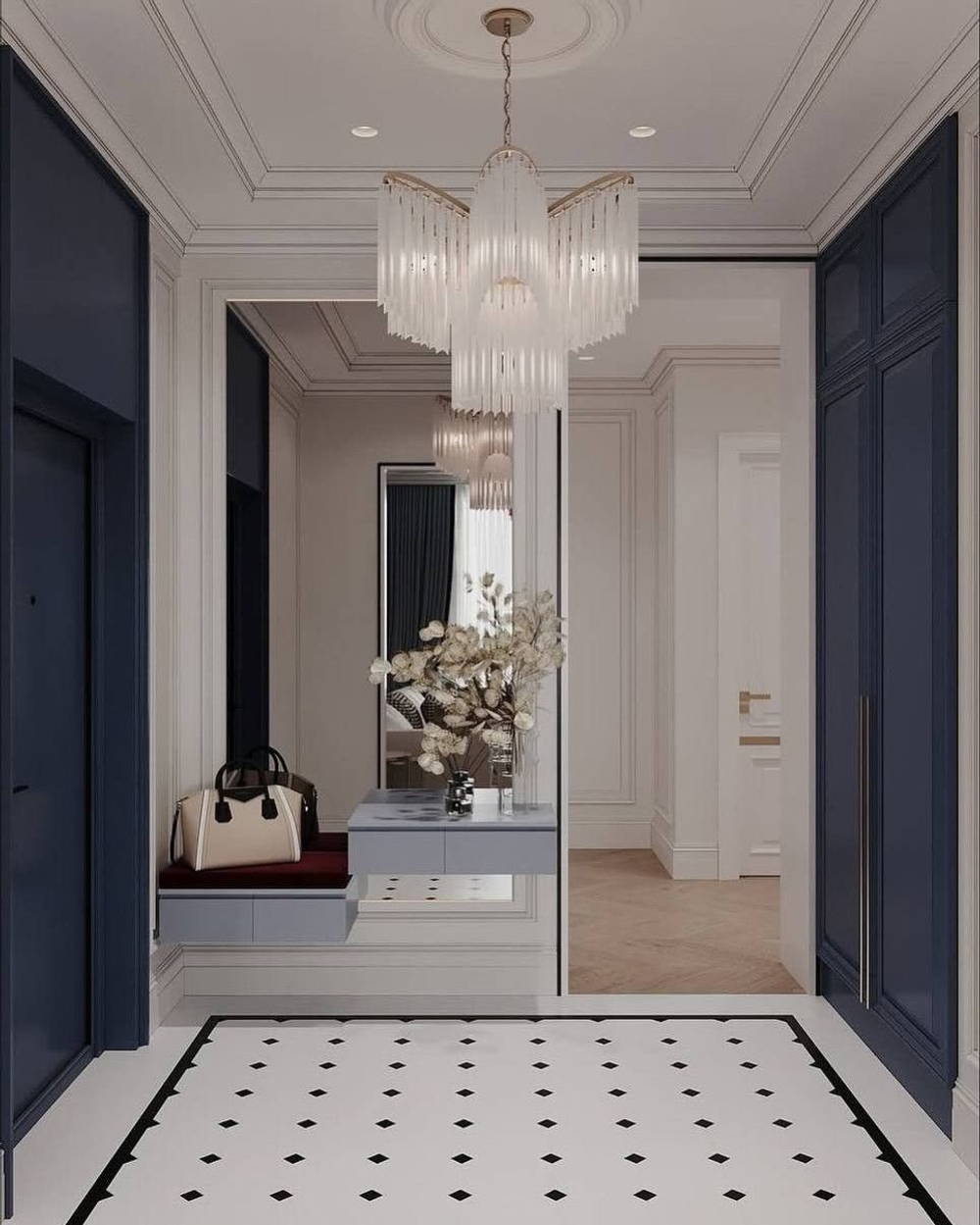 Изысканная каскадная люстра с вытянутыми стеклянными элементами и декоративной потолочной розеткой.