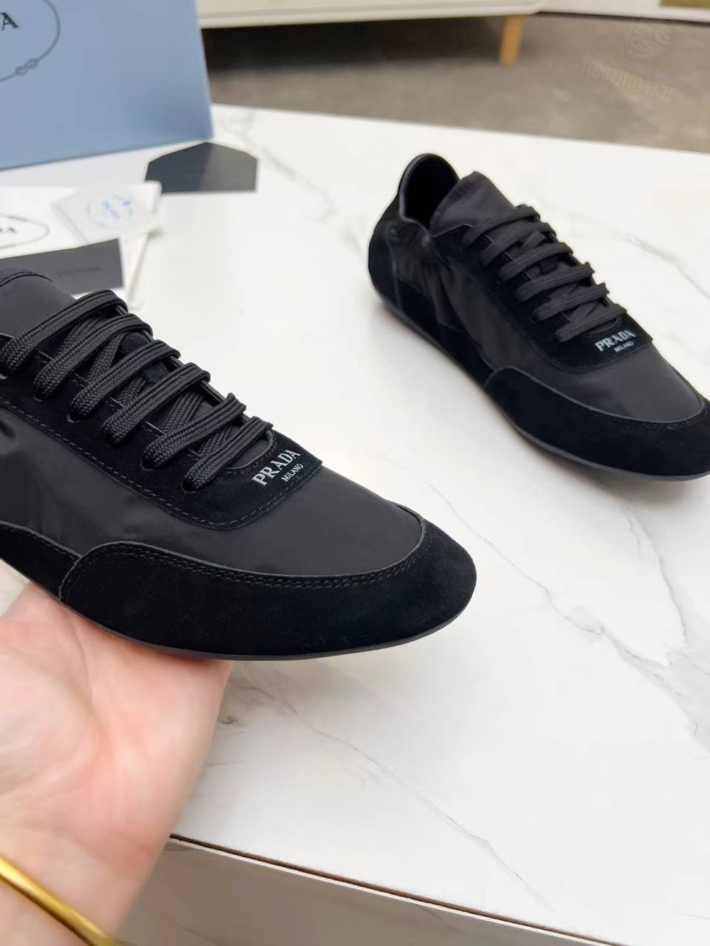 Кроссовки Prada