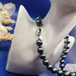 Ювелирное ожерелье из ракушек 10мм.