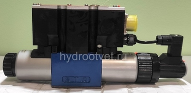 4WREE6E1-16-2X/G24K31/A1V - Пропорциональный распределитель с обратной связью по положению золотника со встроенным усилителем Ду6, A1 = ±10 В, номинальный расход 16 л/мин, схема E1-