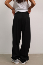 Брюки широкого кроя