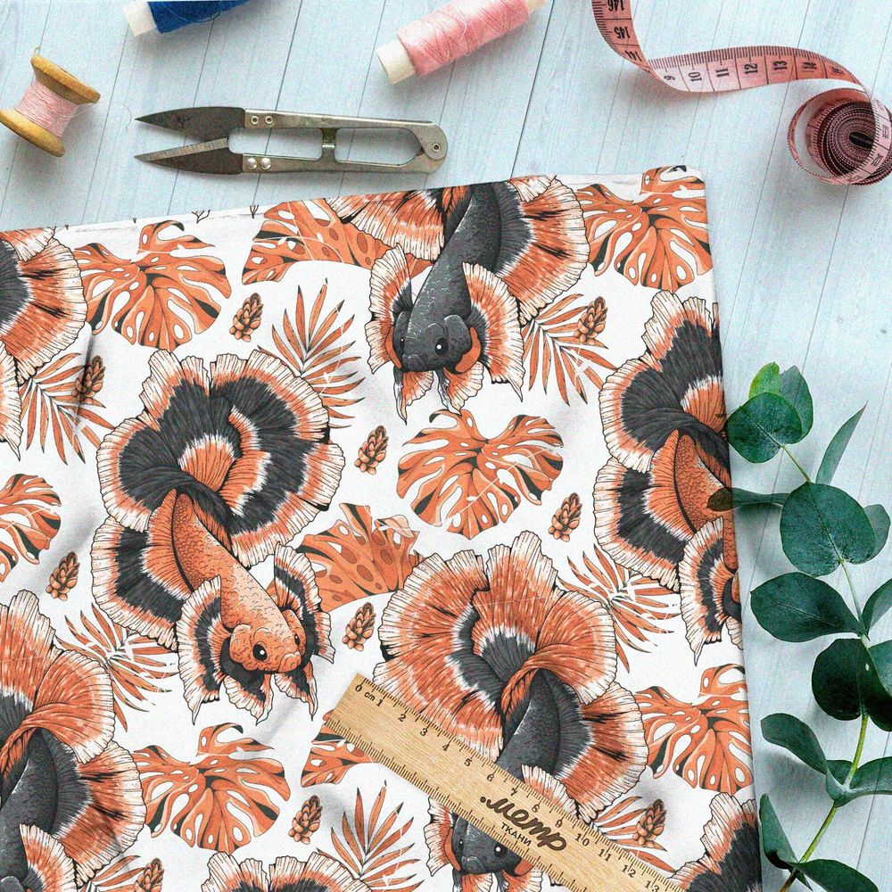 Ткань таффета крупные красные рыбы и листья на белом фоне