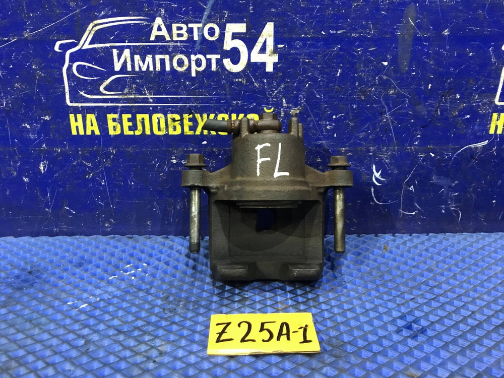 Суппорт тормозной передний левый MITSUBISHI COLT 2003