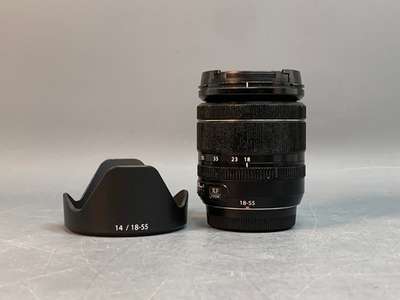 FujiFilm XF 18-55mm 2.8-4 R LM OIS, маленький точка на передней линзе