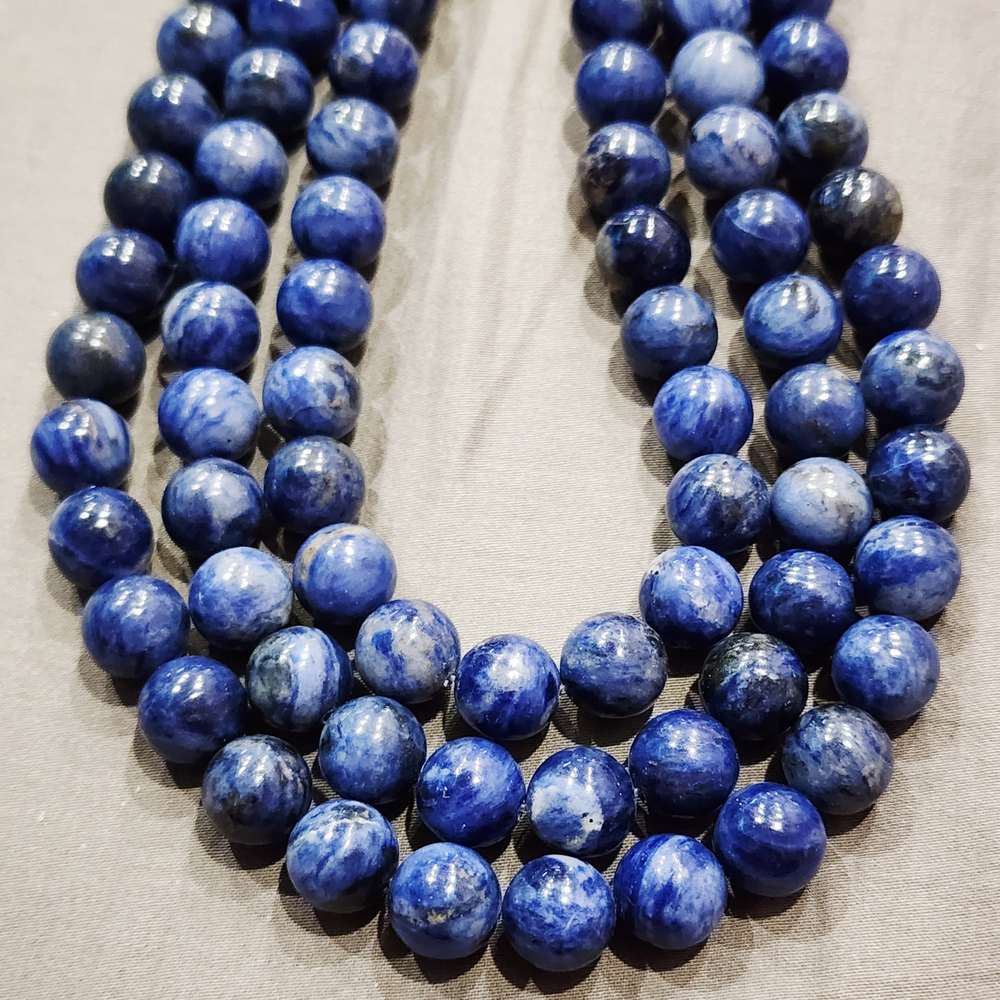 Содалит, яркий, шар 10мм, цена за нить 9.5см (1/4)