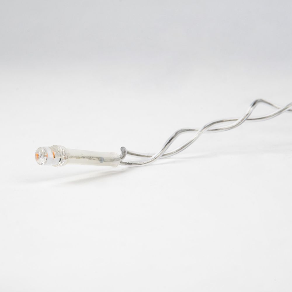 ULD-B12006-195-TTK AMBER IP44 Бахрома светодиодная с эффектом мерцания. 12м. Соединяемая. 195 светодиодов. Янтарный свет. Провод прозрачный. ТМ Uniel