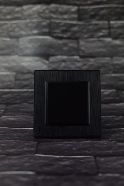 Выключатель одноклавишный черный