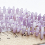 Кунцит, галтовка, размер около 9-12*2-3,5 мм, цена за отрезок 19 см (1/2 нити)