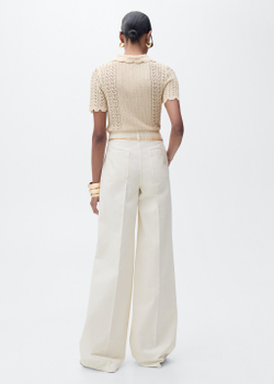 Джинсы с широкими штанинами и высокой посадкой