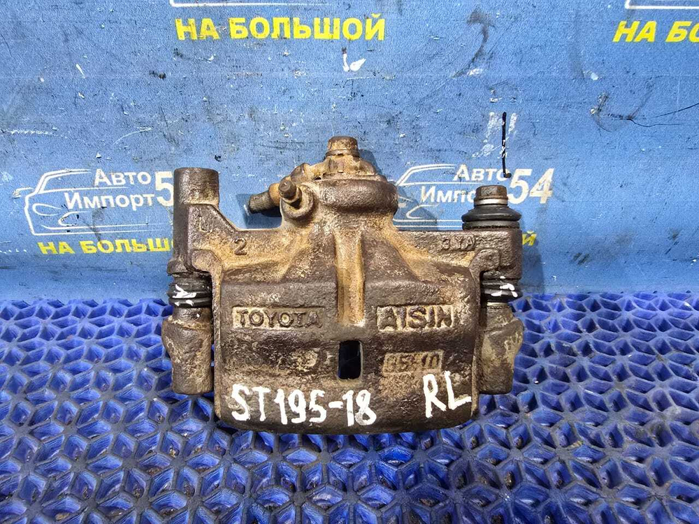 Суппорт тормозной задний левый TOYOTA CORONA 1993
