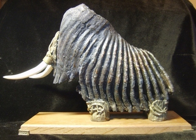 Зуб мамонта, бронза