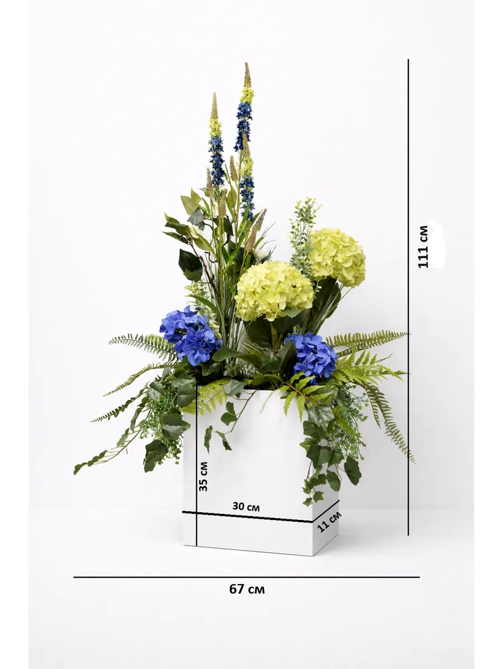 Напольная композиция из искусственных растений и цветов