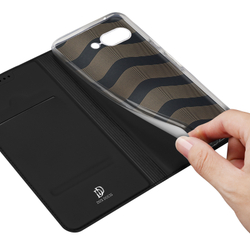Чехол книжка из PU кожи черного цвета от Dux Ducis для Google Pixel 9a, серия Skin Pro Series Case