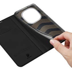 Чехол книжка из PU кожи черного цвета от Dux Ducis для Xiaomi Redmi Note 14 Pro 4G, серия Skin Pro Series Case