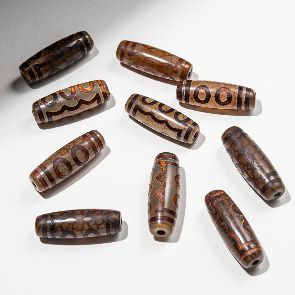 Бусина Дзи "Пять глаз" из агата, 29,5*10мм, коричневый