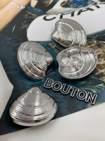 Пуговицы в форме ракушки серебристые