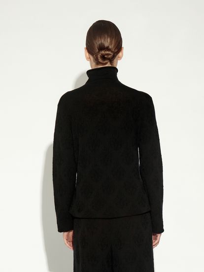 Женский свитер черного цвета из 100% шерсти - фото 3