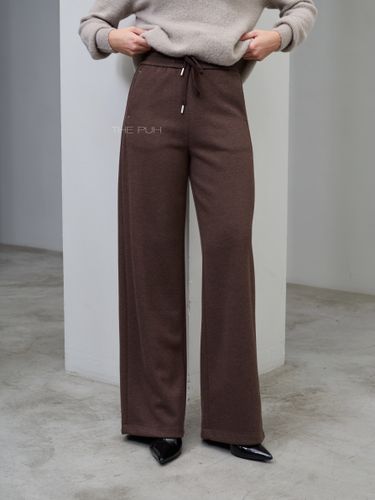 Коричневые брюки из плотного трикотажа