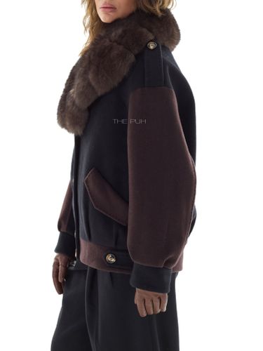 Черная куртка с шоколадными рукавами