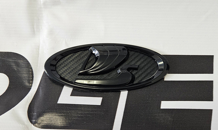 Эмблема решетки радиатора в стиле Lada Sport