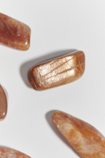 Солнечно-лунный камень галтовка