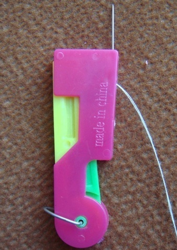 Нитевдеватель автоматический