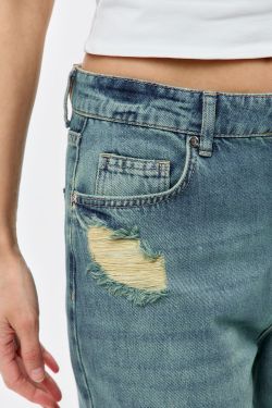 Джинсы wide leg с потертостями сине-зеленого цвета