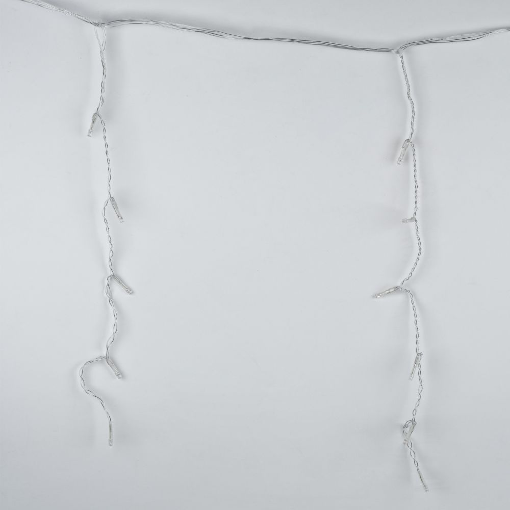 ULD-B12006-195-TTK AMBER IP44 Бахрома светодиодная с эффектом мерцания. 12м. Соединяемая. 195 светодиодов. Янтарный свет. Провод прозрачный. ТМ Uniel