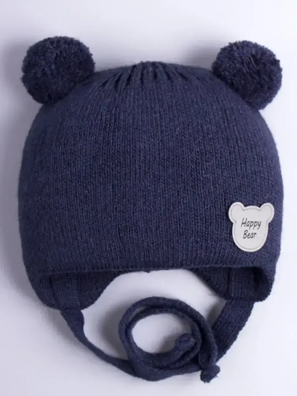 Шапка детская осенняя с завязками и помпонами