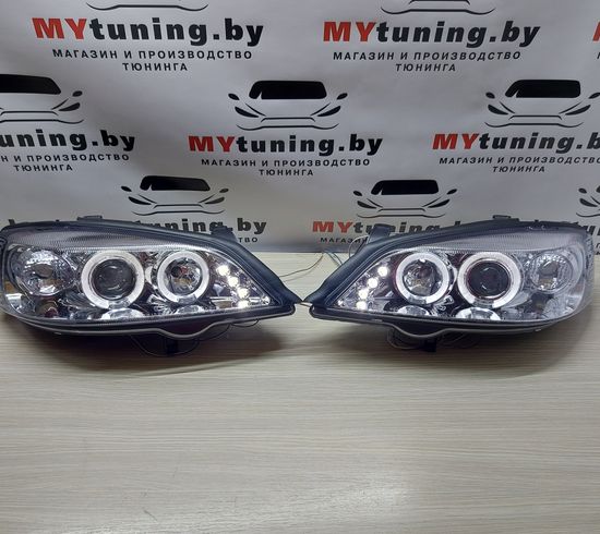 Передние фары Opel Astra G angel eyes chrome