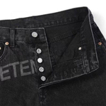 Черные джинсы Vetements с логотипом