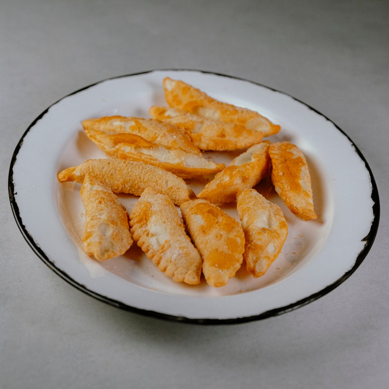 Чебуреки тресковые обжаренные во фритюре