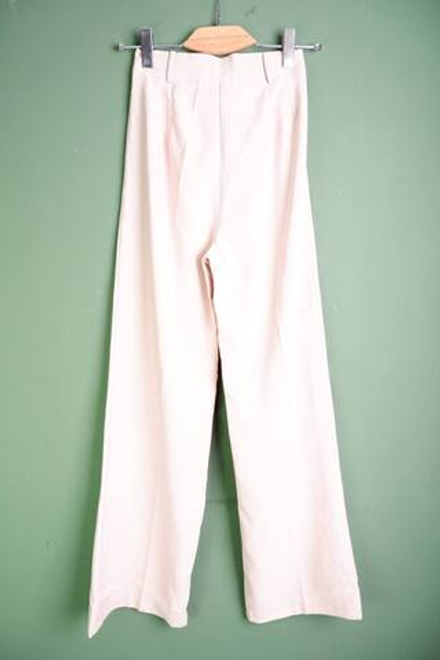 Брюки бежевого цвета, визуально на 42 размер, новые