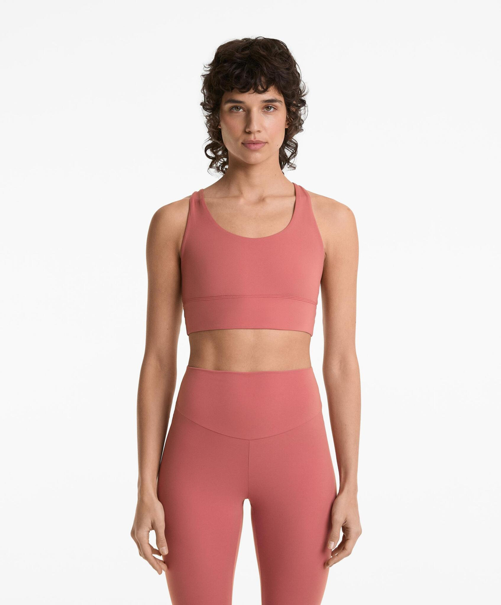 Oysho Спортивный бюстгальтер с бретелями на спине, розоватый