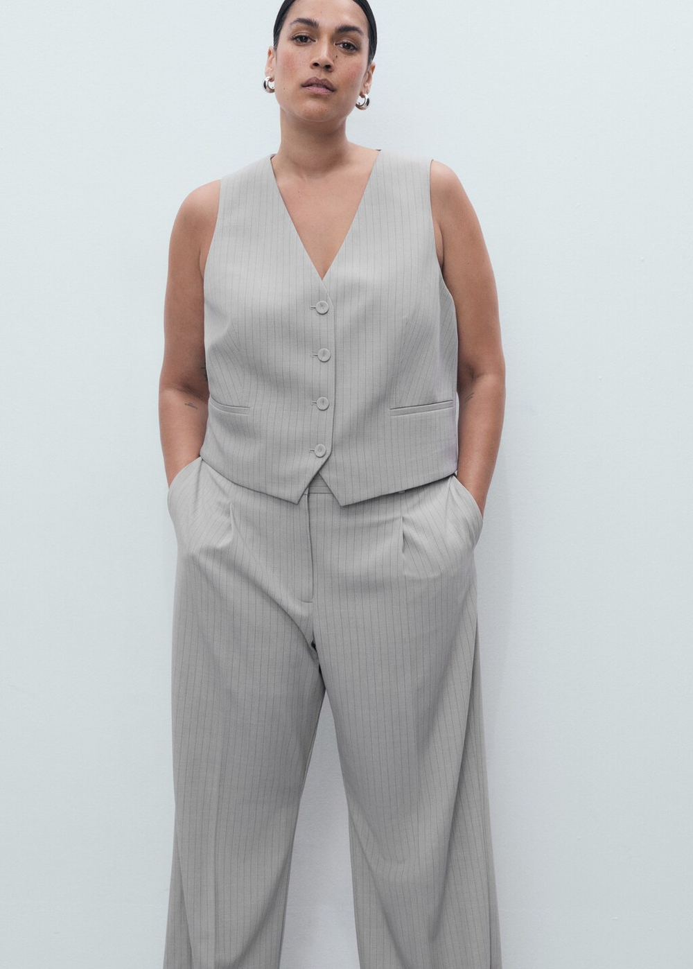 Костюмные брюки в узкую полоску