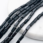 Бусина стекло, цвет черный, размер 6,5*3,5 мм, цена за 29-30 шт (1/2 нити)