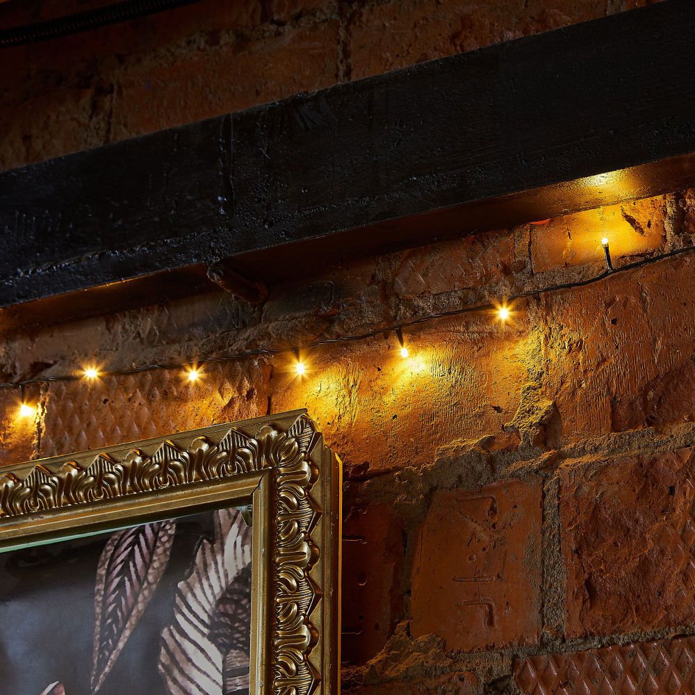 ULD-S2000-200-DGA COPPER IP20 Гирлянда светодиодная. 20м. 200 светодиодов. Медный свет. Провод зеленый. ТМ Uniel