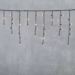 Светодиодная бахрома с колпачком 3,1*0,5 м., 120 экстра теплых белых LED ламп, каучуковый черный провод, LTC (LL120-1-2EWW)