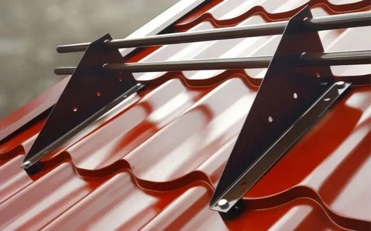 Монтаж снегозадержателей