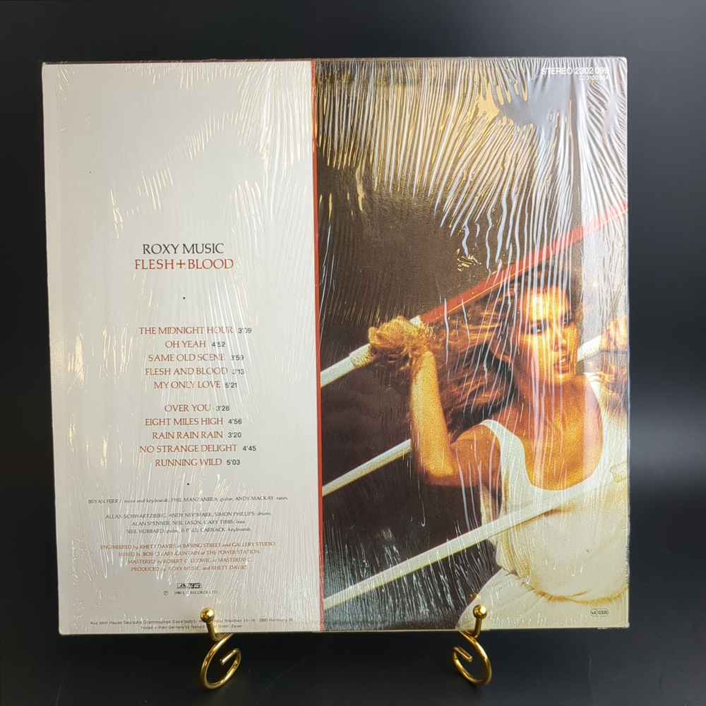 LP Roxy Music - Flesh + Blood Зарубежный рок. Виниловая пластинка 12 дюймов.Германия.1980 год. Конверт VG+ / Диск VG+
