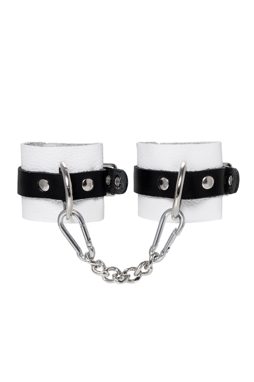 Бело-черные кожаные наручники с одним ремешком с люверсами